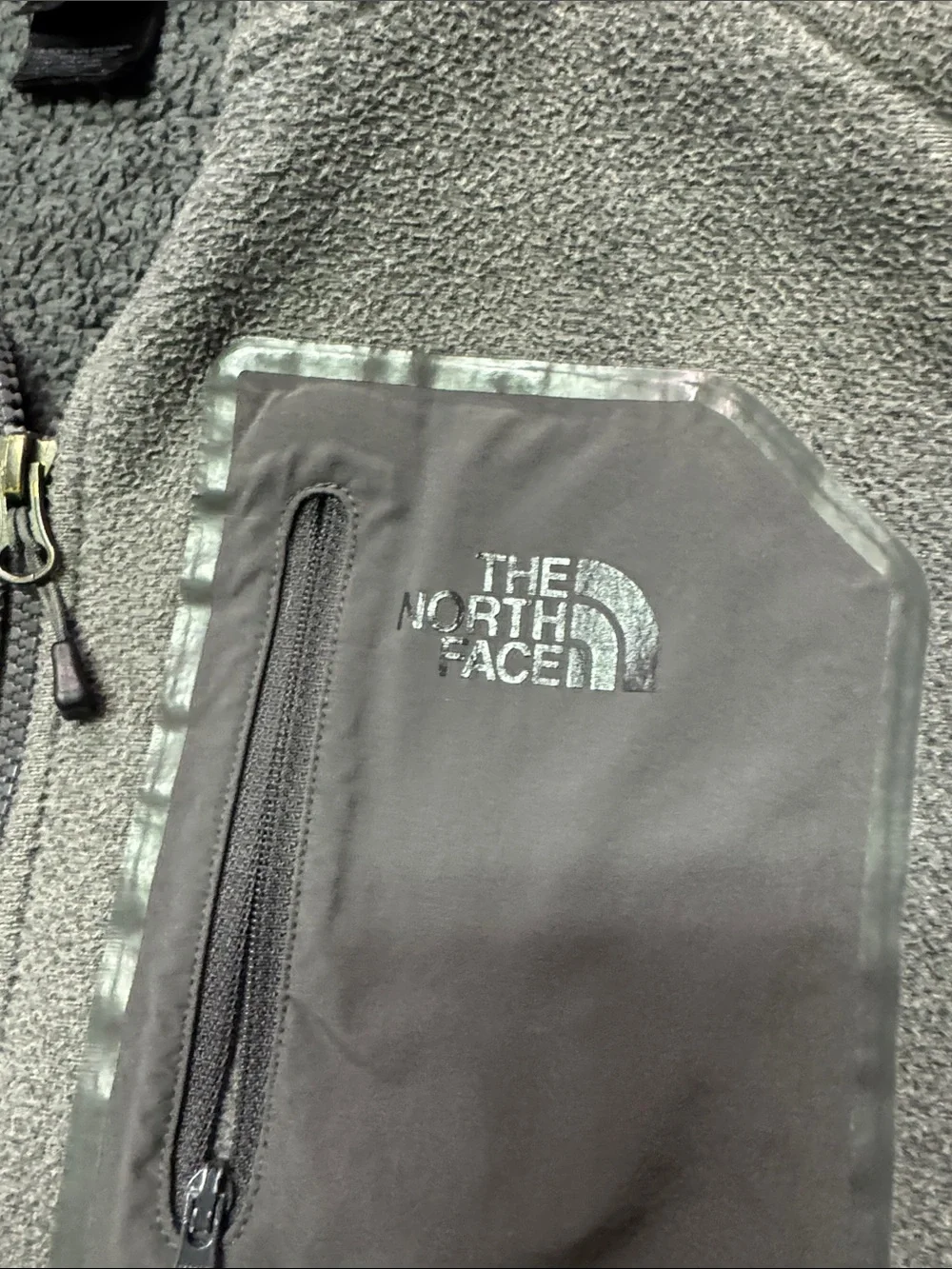 The North Face Gray Zip-Up Fleece Jacket with Chest Pocket